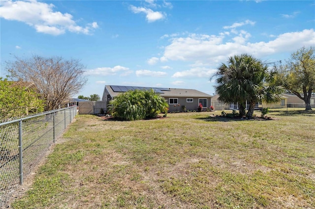 view of yard featuring a fenced backyard