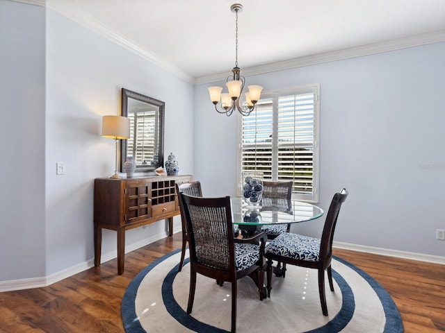 dining space with a chandelier, wood finished floors, and a wealth of natural light