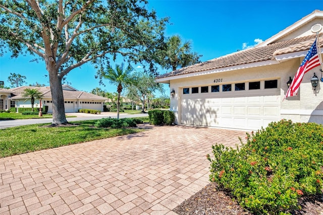 garage with driveway