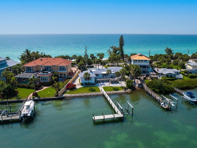 bird's eye view featuring a water view and a residential view