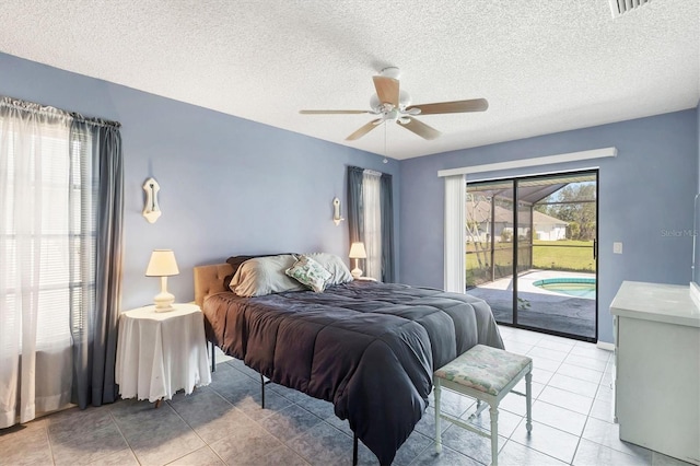 bedroom with light tile patterned floors, visible vents, a ceiling fan, access to exterior, and a textured ceiling