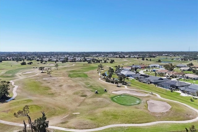 aerial view with a residential view and view of golf course