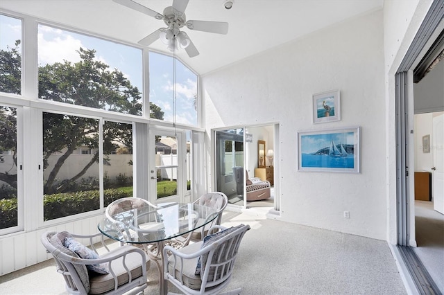 sunroom with a ceiling fan