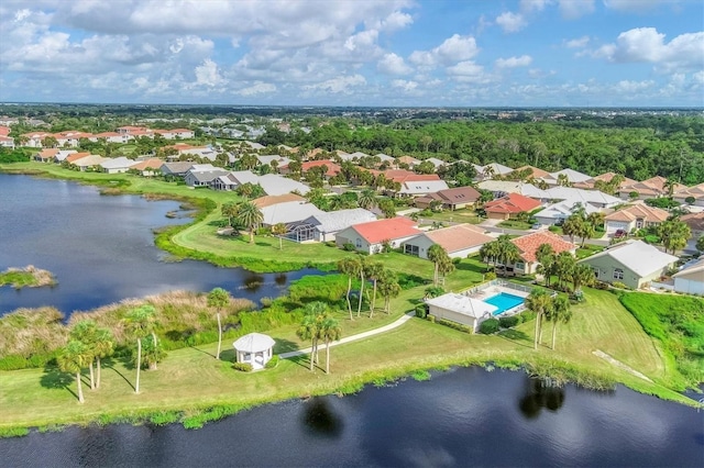 aerial view featuring a water view and a residential view