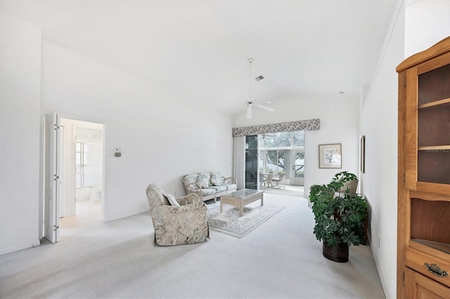 sitting room with light carpet, ceiling fan, and high vaulted ceiling