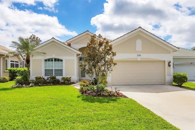 ranch-style house with an attached garage, a front yard, concrete driveway, and stucco siding