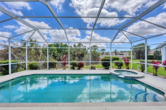 view of pool with glass enclosure and a pool with connected hot tub