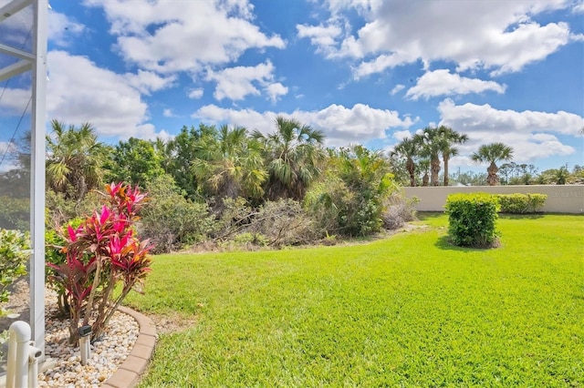 view of yard featuring fence