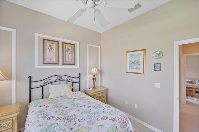 bedroom with baseboards, visible vents, and a ceiling fan