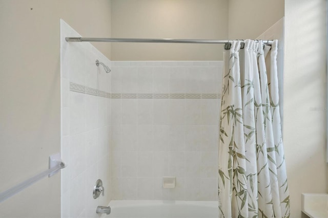 bathroom featuring shower / bath combination with curtain