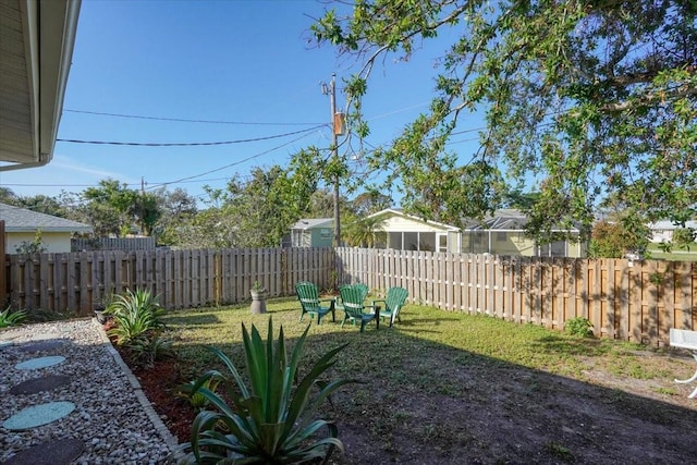 view of yard featuring a fenced backyard