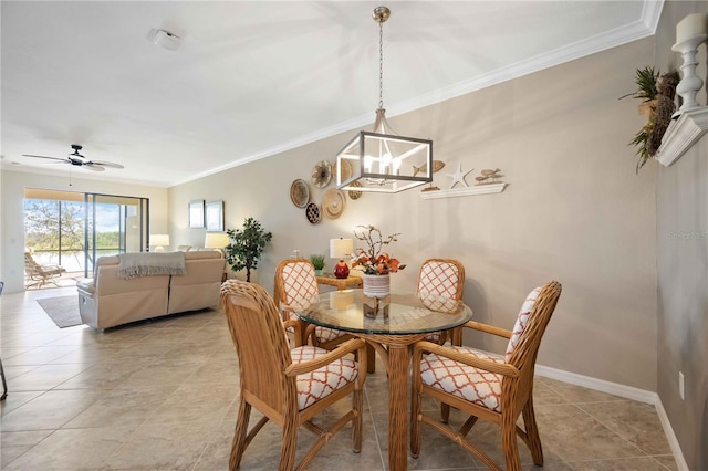 dining space featuring baseboards, light tile patterned floors, ceiling fan with notable chandelier, and crown molding