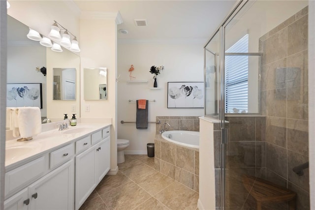 bathroom with ornamental molding, a sink, a shower stall, and a bath