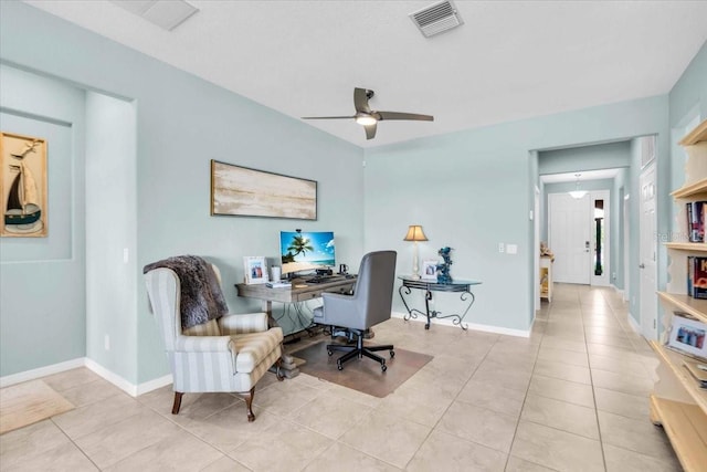 tiled home office with a ceiling fan, baseboards, and visible vents