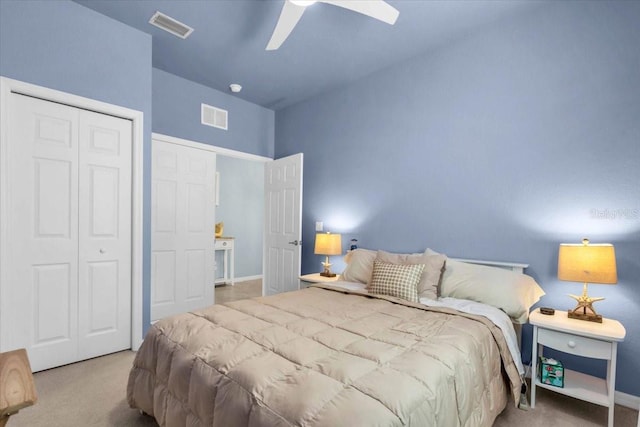 bedroom featuring carpet, visible vents, and a closet