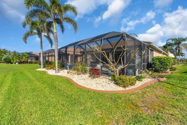 view of yard featuring glass enclosure