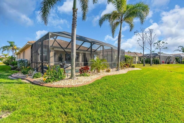 view of yard with a lanai