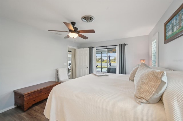 bedroom with access to exterior, visible vents, dark wood finished floors, and ceiling fan