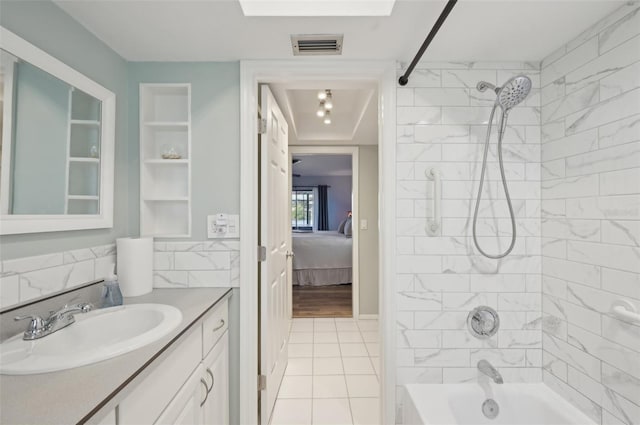 full bath featuring shower / bath combination, vanity, visible vents, and tile patterned floors