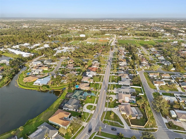 aerial view featuring a water view and a residential view