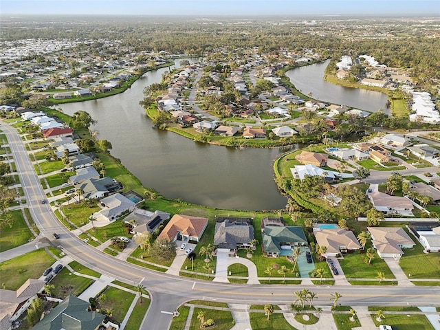 aerial view featuring a water view and a residential view