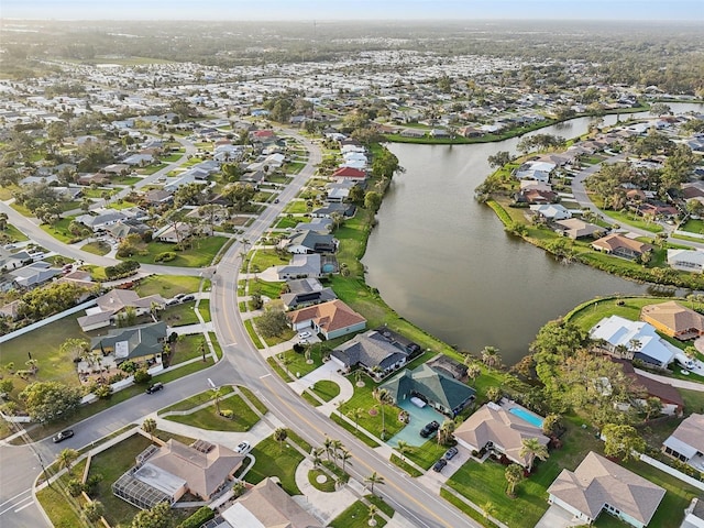 aerial view with a water view and a residential view