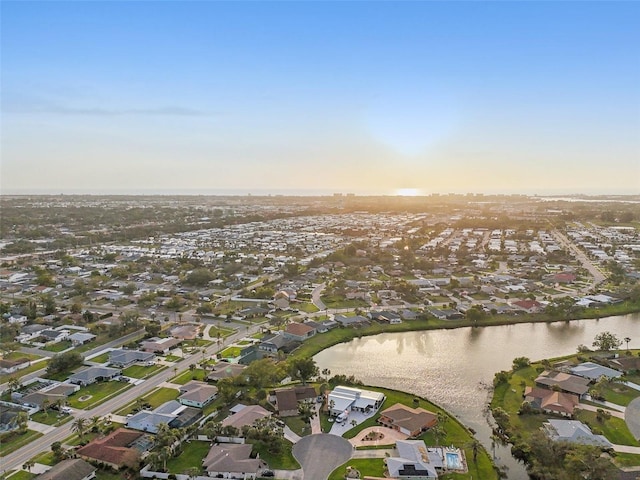 bird's eye view with a water view and a residential view