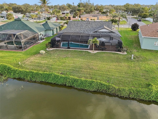 aerial view featuring a water view and a residential view