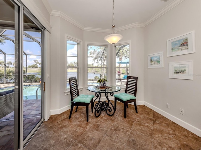 living area featuring a sunroom, baseboards, and crown molding