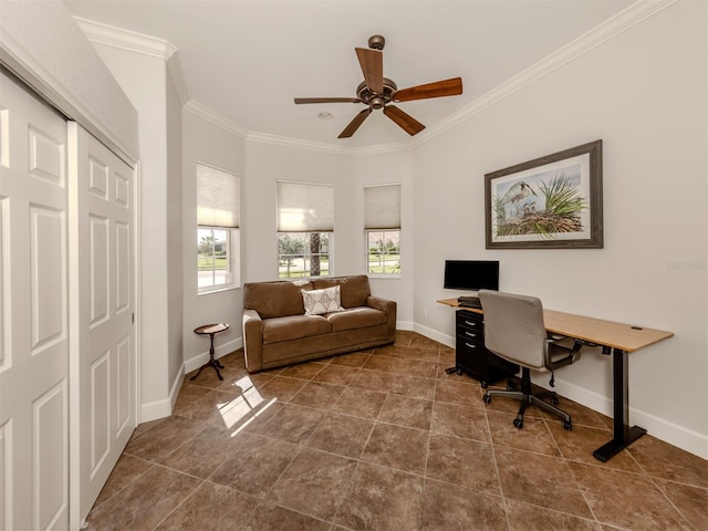 office space with baseboards, a ceiling fan, and crown molding