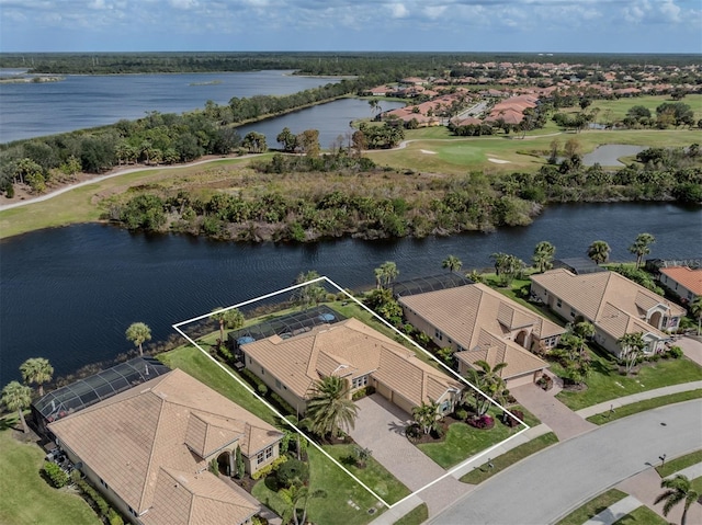 bird's eye view featuring a water view and a residential view