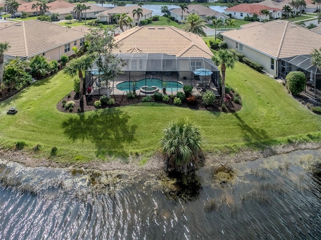 aerial view featuring a residential view and a water view