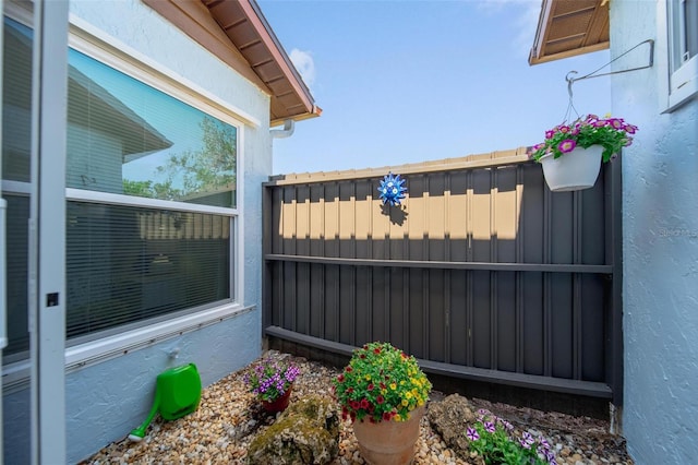 view of gate featuring fence