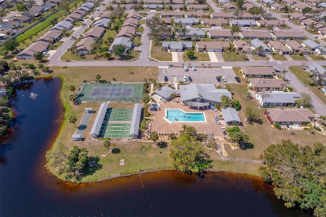 aerial view with a water view and a residential view