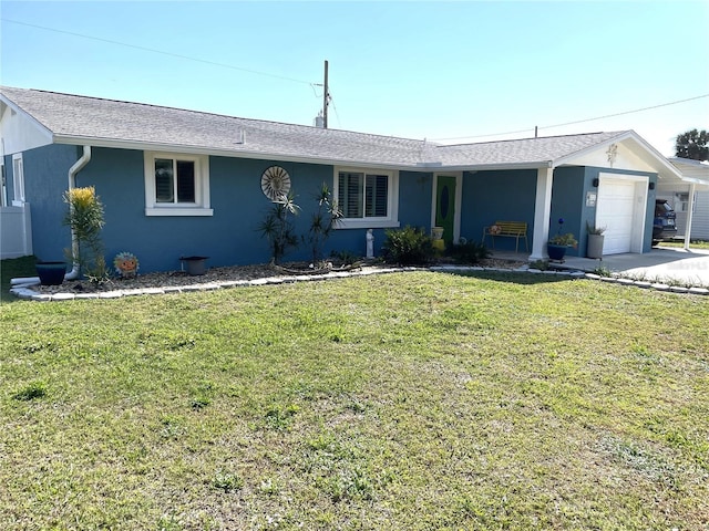 single story home with an attached garage, stucco siding, and a front yard