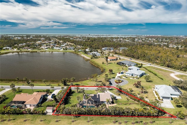 drone / aerial view with a water view