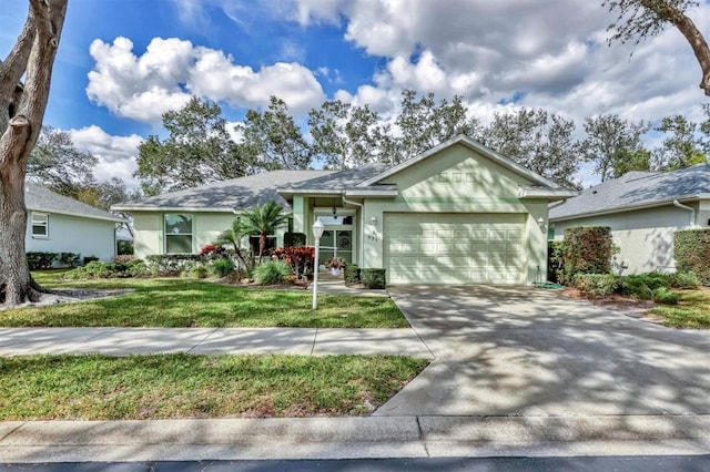 single story home featuring a garage, stucco siding, concrete driveway, and a front yard