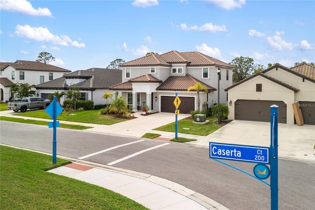 exterior space featuring traffic signs, a residential view, and sidewalks