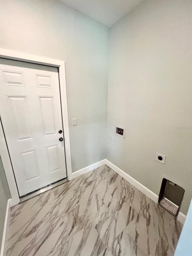 washroom featuring laundry area, baseboards, marble finish floor, hookup for an electric dryer, and washer hookup