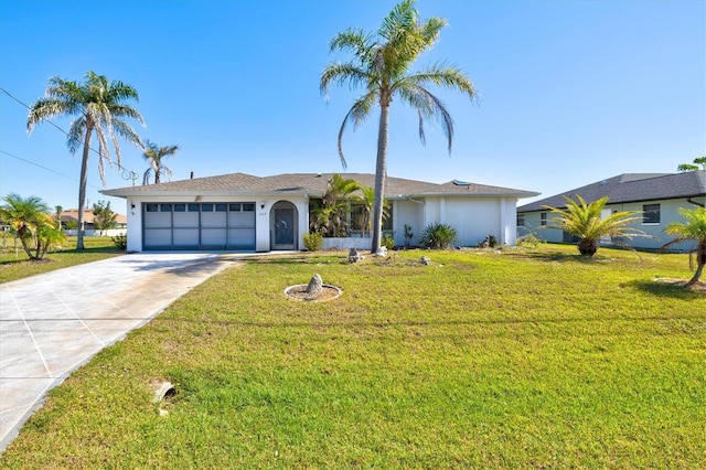 view of front of home with stucco siding, driveway, an attached garage, and a front lawn