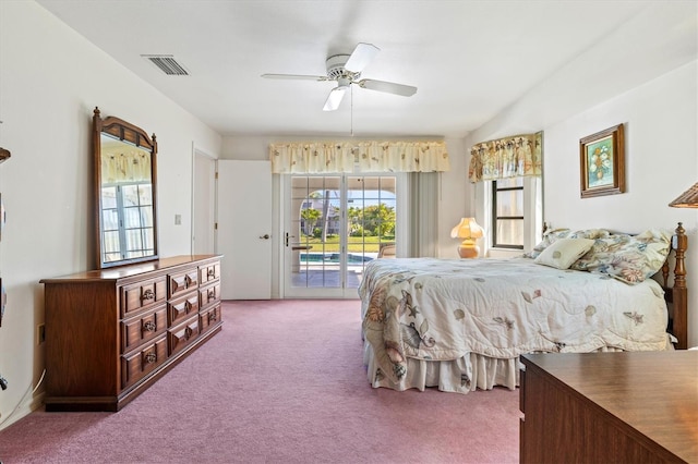 carpeted bedroom featuring access to outside, visible vents, and ceiling fan