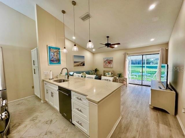 kitchen with visible vents, white cabinetry, a sink, dishwasher, and a peninsula