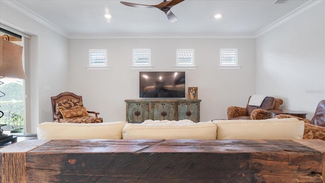 living area featuring recessed lighting, a ceiling fan, and crown molding