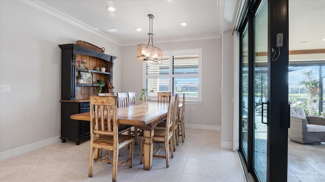 dining room featuring crown molding, baseboards, a notable chandelier, and recessed lighting