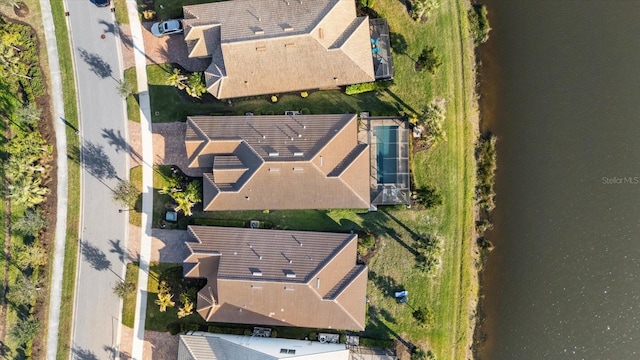 drone / aerial view featuring a water view