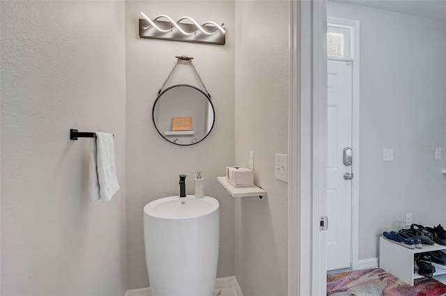 bathroom with baseboards