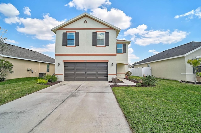 traditional-style home with central air condition unit, stucco siding, an attached garage, a front yard, and driveway