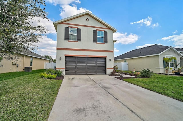 traditional-style home featuring concrete driveway, central air condition unit, a front yard, and stucco siding