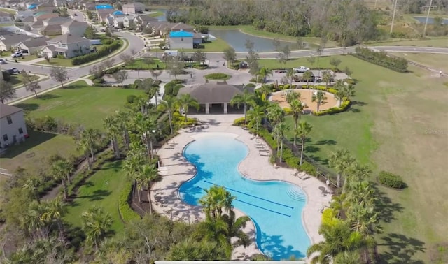 birds eye view of property featuring a residential view and a water view