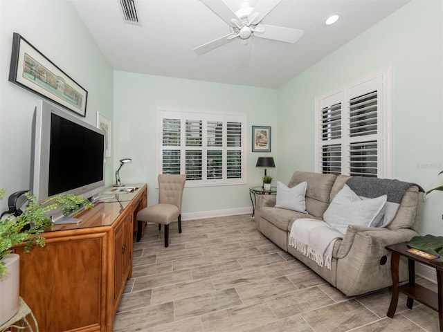 living area featuring visible vents, recessed lighting, baseboards, and a ceiling fan